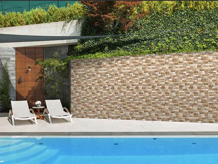 สร้างบรรยากาศธรรมชาติริมสระน้ำ กับผนังกระเบื้องลายหิน