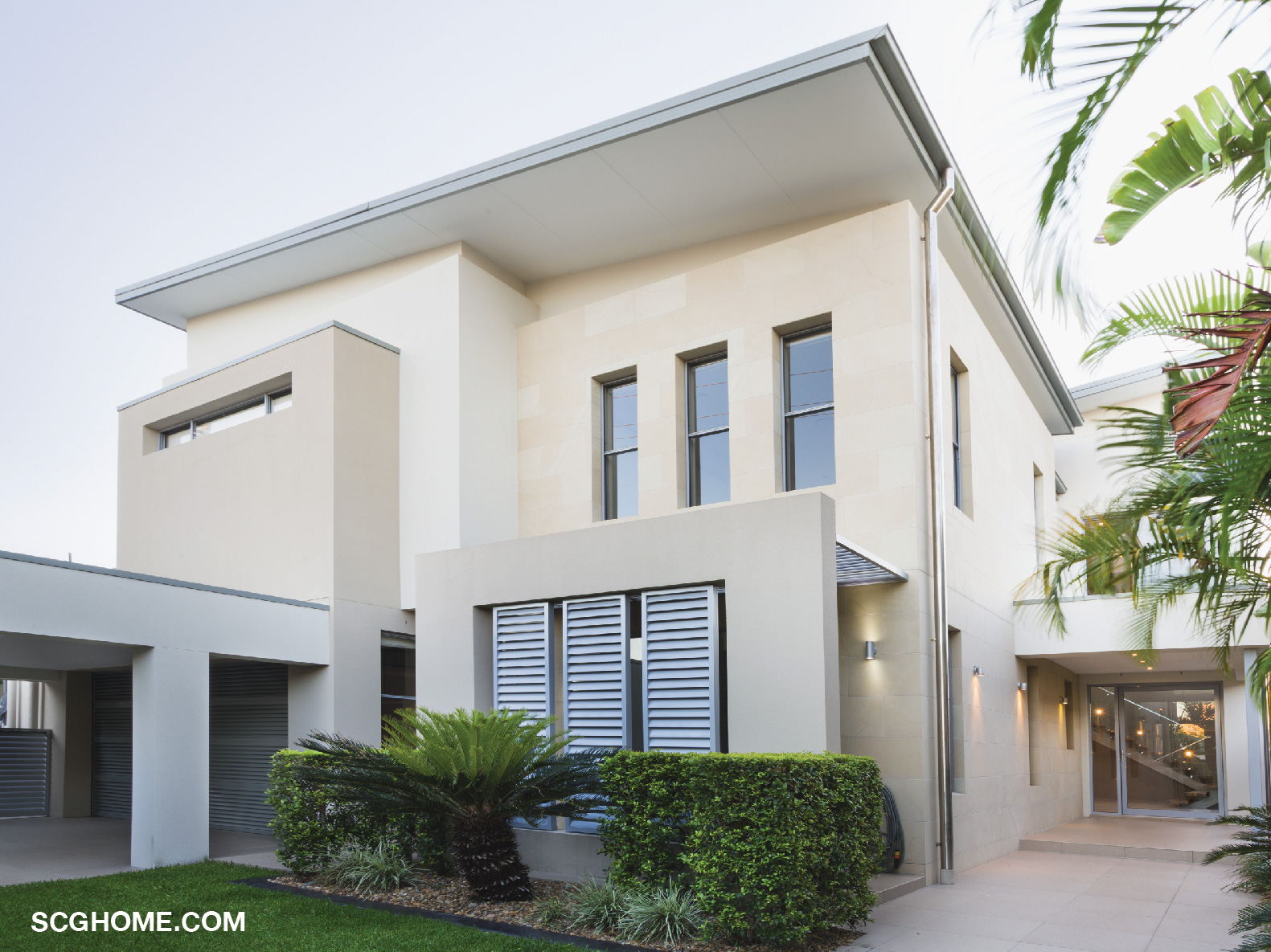 บ้านกล่องที่มีหลังคาเรียบแบน บาง และยื่นชายคาน้อย